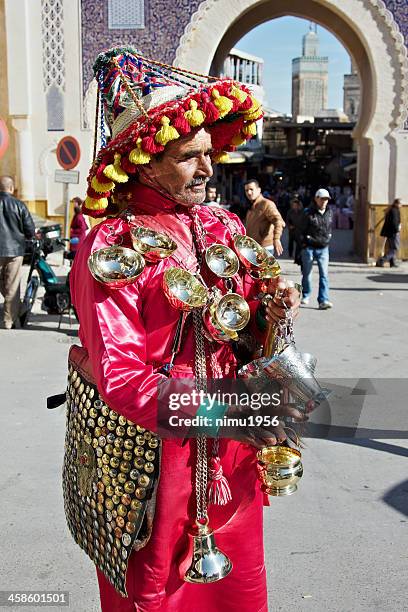 traditional water seller fez, morocco - bab boujeloud stock pictures, royalty-free photos & images