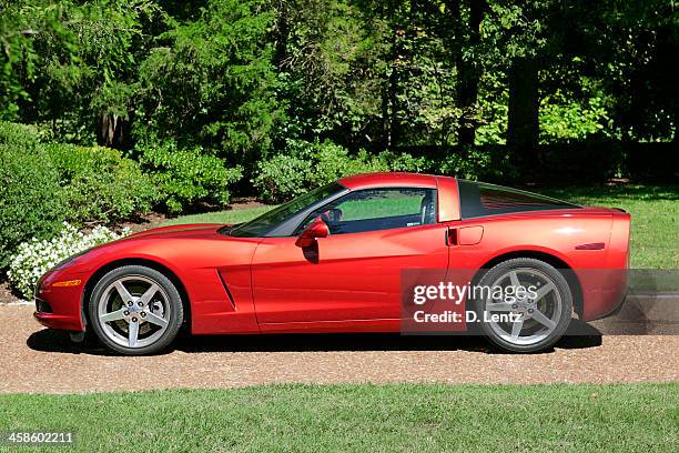 red chevrolet corvette - chevrolet corvette stock pictures, royalty-free photos & images