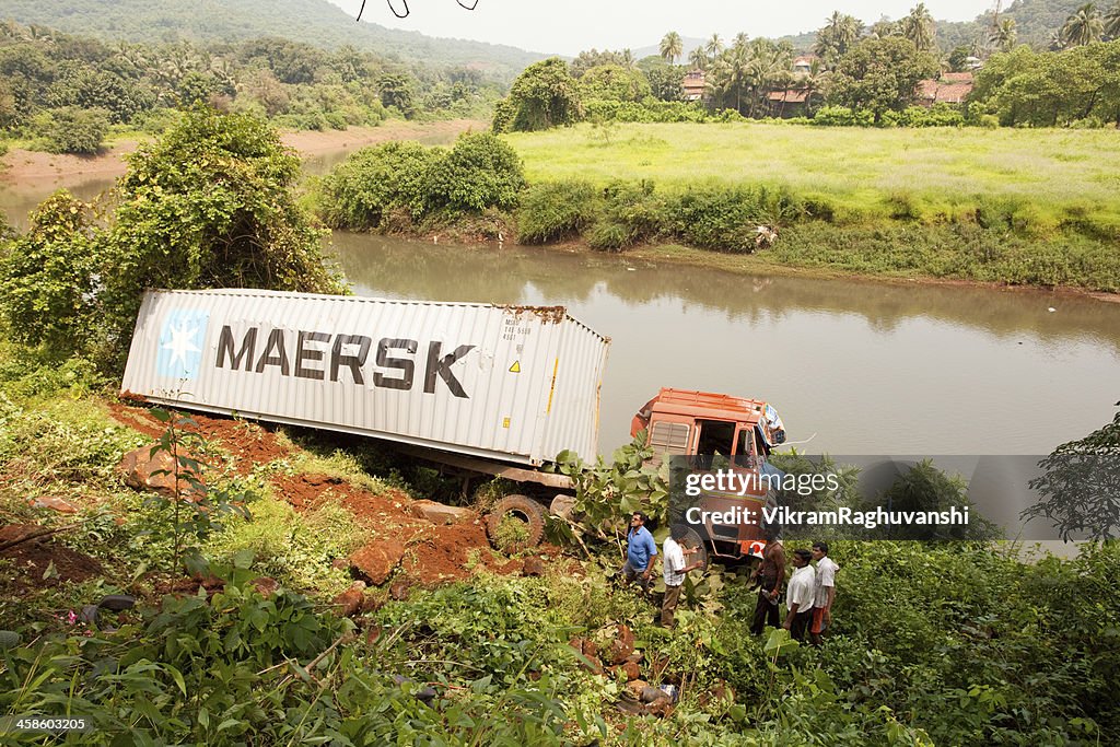 One Heavy Vehicle turn turtle on Pune Goa Highway