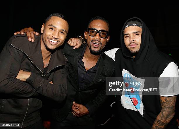 Recording artist Trey Songz, actor Bill Bellamy and recording artist Chris Brown attend the 2014 Soul Train Music Awards at the Orleans Arena on...