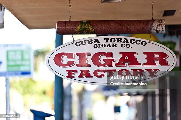 cigar factory sign - shop sign stock pictures, royalty-free photos & images
