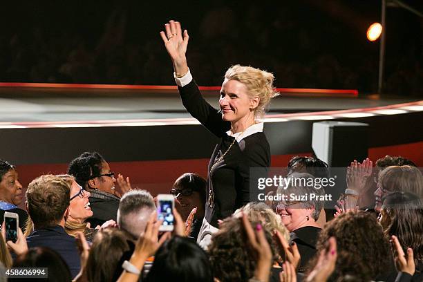 Author Elizabeth Gilbert waves at the crowd at Oprah's The Life You Want Weekend on November 7, 2014 in Seattle, Washington.