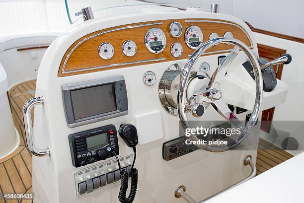 control panel and helm on motor yacht - motor yacht stock pictures, royalty-free photos & images