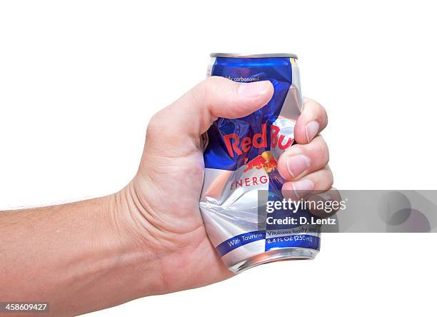 redbull zerstoßenen können - energydrink stock-fotos und bilder