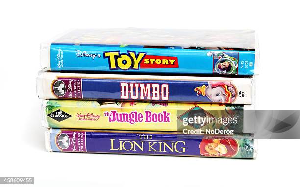 disney vintage vhs tapes - videocassette stock pictures, royalty-free photos & images