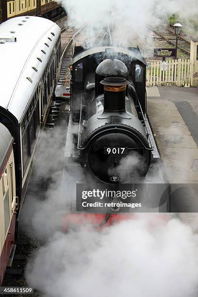 steam locomotive pulls into horsted keynes station, bluebell railway - horsted keynes station stock pictures, royalty-free photos & images