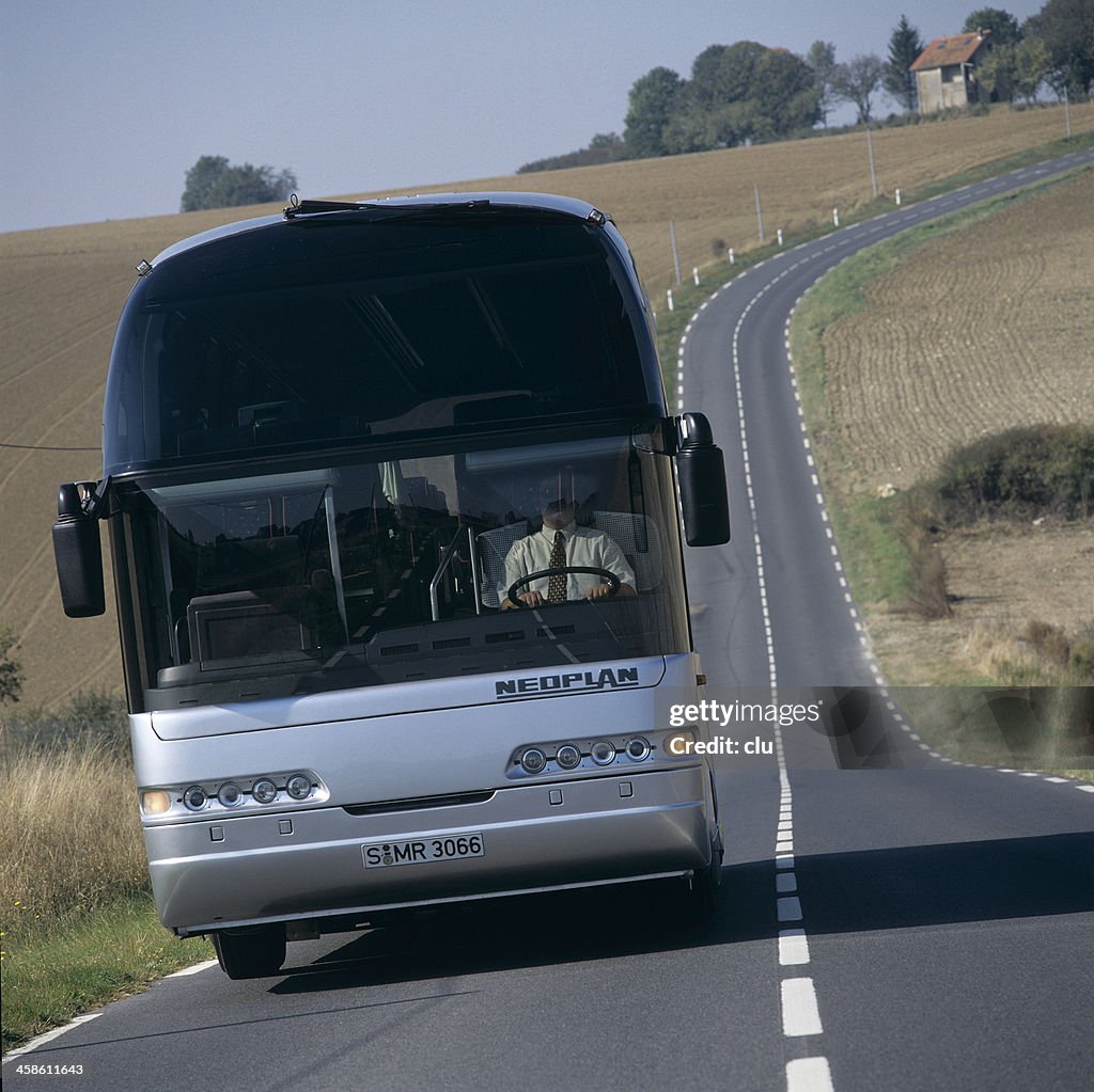 Country Rider Bus Bus Driving On A Country Road High-Res Stock Photo - Getty Images