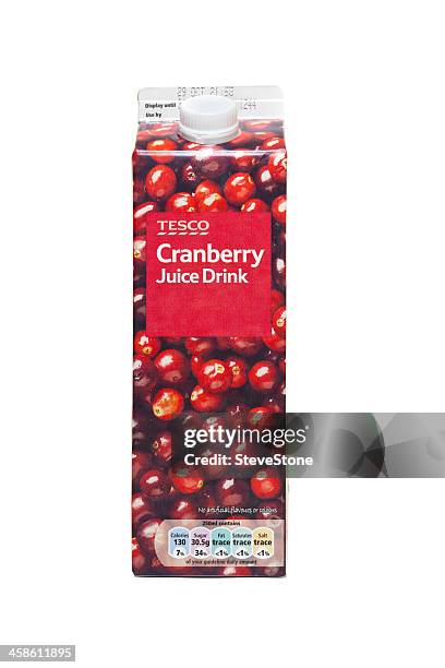 box of tesco cranberry juice drink isolated on white - cranberry juice stock pictures, royalty-free photos & images