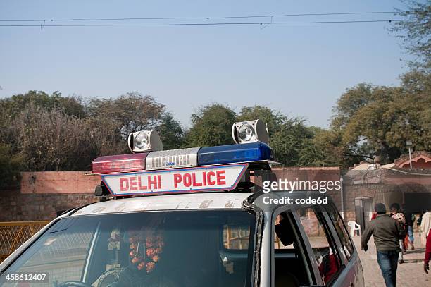 police car in new delhi, india - terrorism stock pictures, royalty-free photos & images
