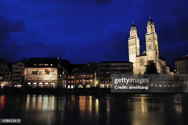 zurich at night - grossmunster cathedral stock pictures, royalty-free photos & images