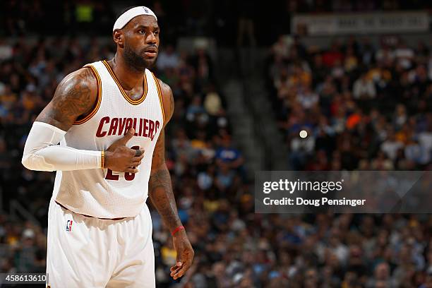 LeBron James of the Cleveland Cavaliers plays against the Denver Nuggets at Pepsi Center on November 7, 2014 in Denver, Colorado. The Cavaliers...