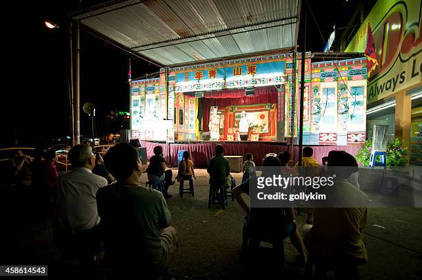 chinese street opera during hungry ghost month - hungry ghost festival stock pictures, royalty-free photos & images