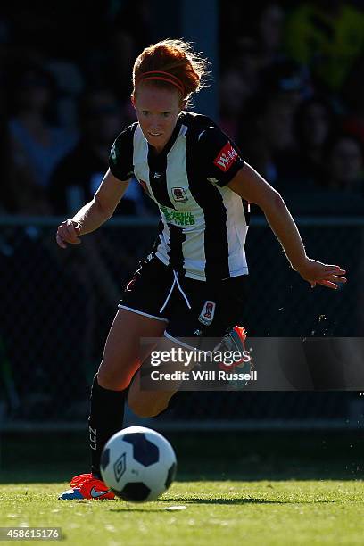 Victoria Huster of the Jets runs with the ball during the round nine W-League match between Perth and Newcastle at Ashfield Sports Club on November...