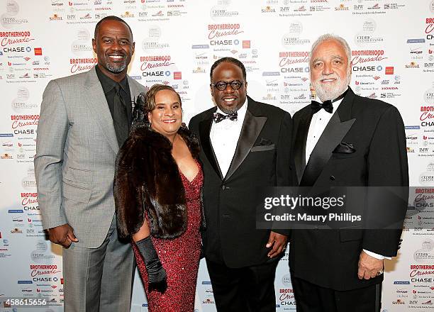 Brian McKnight, President and CEO of the Brotherhood Crusade Charisse Beamond Weaver, Cedric the Entertainer and President and CEO of the Los Angeles...