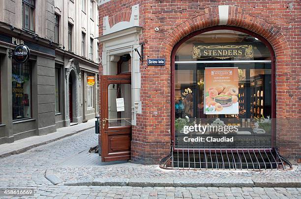 shop in old riga - riga stock pictures, royalty-free photos & images