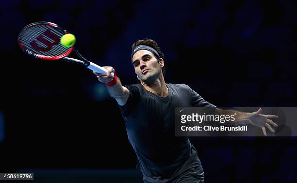 Roger Federer of Switzerland plays a forehand in practice during the Barclays ATP World Tour Finals tennis previews at the O2 Arena on November 8,...