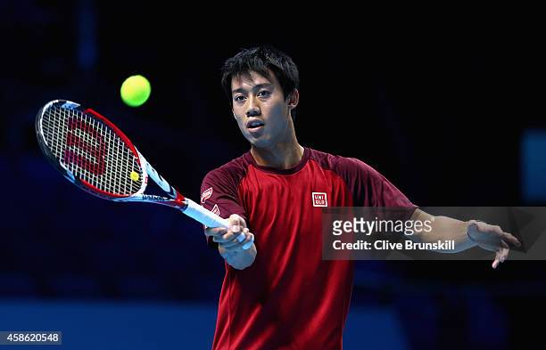 Kei Nishikori of Japan plays a forehand in practice during the Barclays ATP World Tour Finals tennis previews at the O2 Arena on November 8, 2014 in...