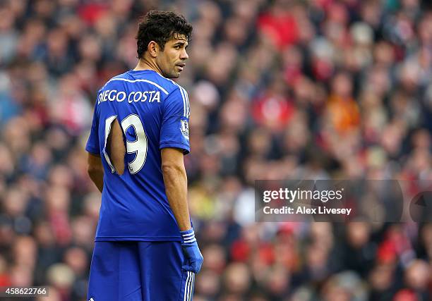 Diego Costa of Chelsea looks on with a ripped shirt during the Barclays Premier League match between Liverpool and Chelsea at Anfield on November 8,...