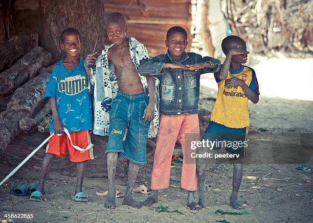 village boys. - gambia stock pictures, royalty-free photos & images