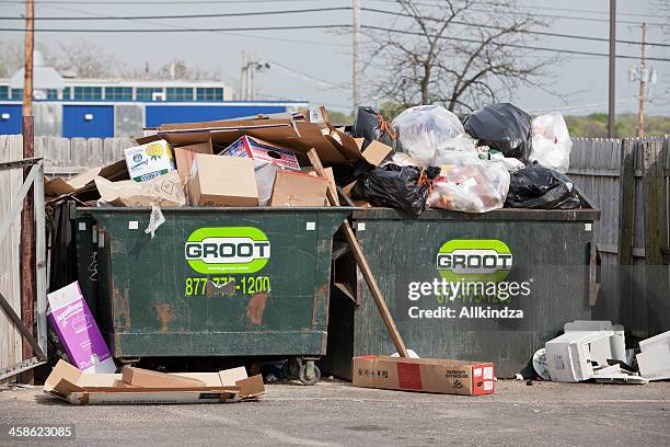 overflowing trash dumpsters - extra groot stock pictures, royalty-free photos & images