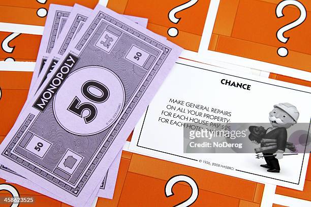 monopoly game chance card for property repairs - monopoly chance stock pictures, royalty-free photos & images