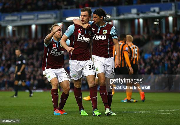 Ashley Barnes of Burnley celebrates scoring the opening goal with team mates during the Barclays Premier League match between Burnley and Hull City...