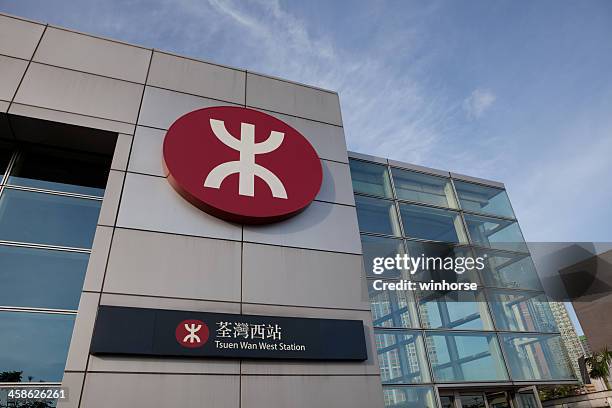 mass transit rail (mtr) station in hong kong - mtr logo stock pictures, royalty-free photos & images