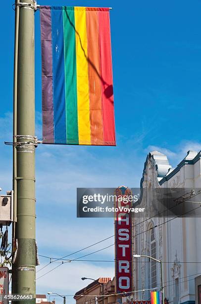 gay pride rainbow flag castro theater san francisco - castro district stock pictures, royalty-free photos & images