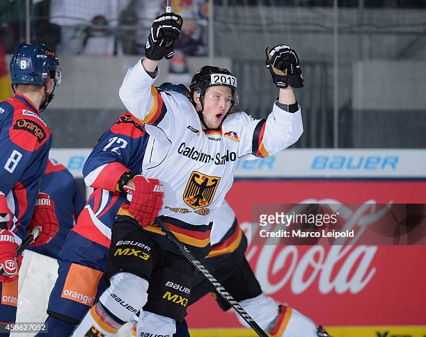 Patrick Hager of Team Germany celebrates during the game between Germany and Slovakia on November 8, 2014 in Munich, Germany.