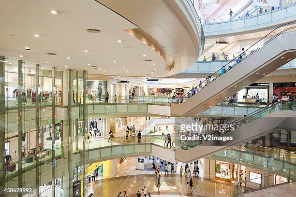 shopping mall - shoppingcenter stock-fotos und bilder