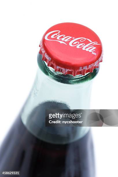 coke classic bottle cap - cola bottle stock pictures, royalty-free photos & images