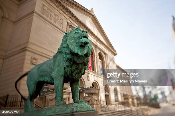 lion statue in the art institute of chicago - chicago art museum stock pictures, royalty-free photos & images