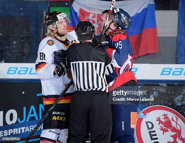 Torsten Ankert of Team Germany and Marek Viedensky of Team Slovakia battle during the game between Germany and Slovakia on November 8, 2014 in...