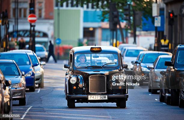 london black cab - london taxi stock pictures, royalty-free photos & images