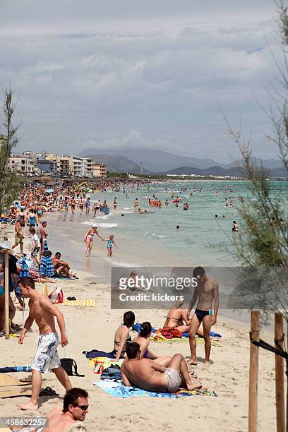 mallorca beach crowded with tourists - skimpy bathing suits stock pictures, royalty-free photos & images