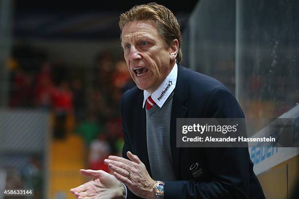 Glen Hanlon, head coach of Switzerland reacts during match 4 of the Deutschland Cup 2014 between Switzerland and Canada at Olympia Eishalle on...