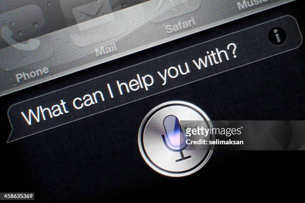 siri application on iphone 4s - voice search stock pictures, royalty-free photos & images