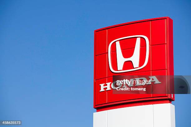 honda sign at car dealership - honda stock pictures, royalty-free photos & images