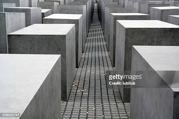 light &amp; shadow on holocaust memorial in berlin, germany - war memorial stock pictures, royalty-free photos & images