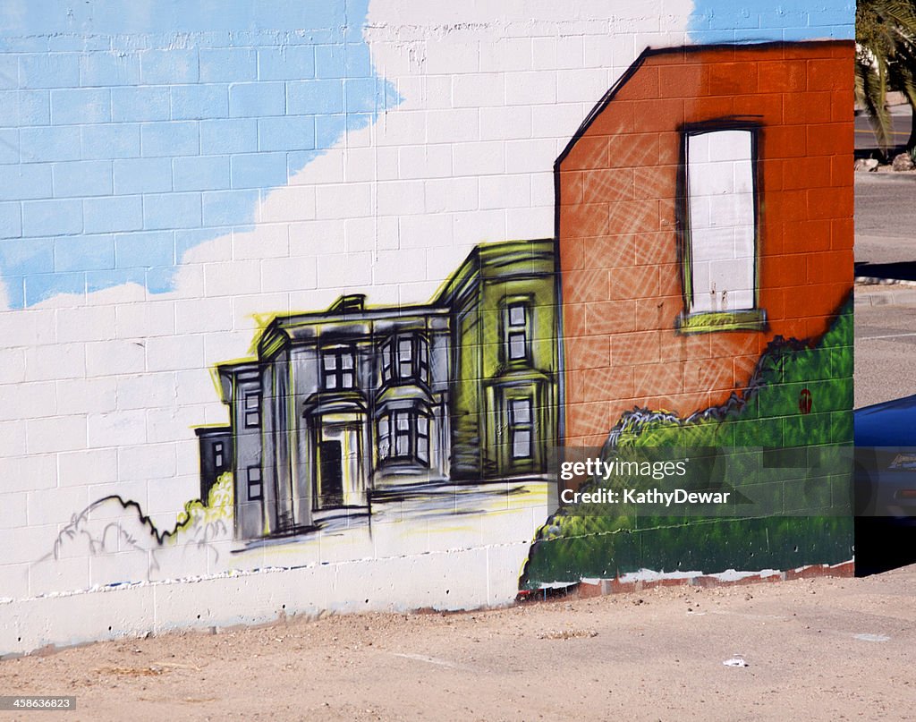 Cemento de pared pintada como hogares