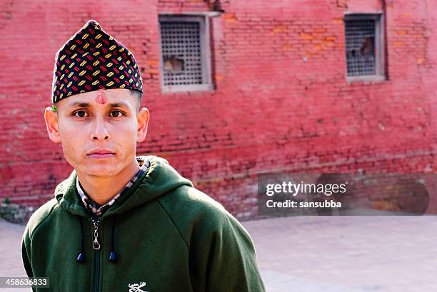 young nepalese man - nepal culture stock pictures, royalty-free photos & images