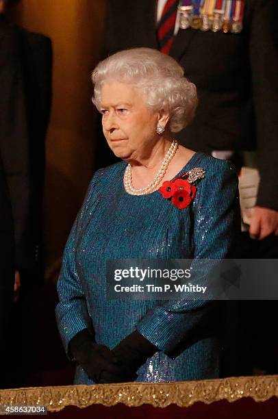 Queen Elizabeth II watches The Royal British Legion's Festival of Remembrance at Royal Albert Hall on November 8, 2014 in London, England.