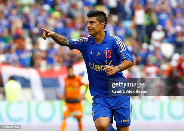 Patricio Rubio of U de Chile celebrates after scoring his team's second goal during a match between Cobreloa and U de Chile as part of round 14 of...