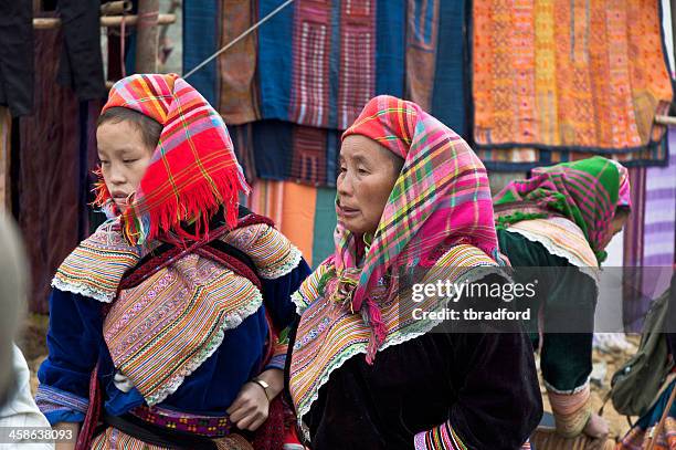 hmong women at bac ha market in vietnam - hill tribes stock pictures, royalty-free photos & images