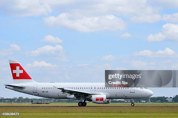 swiss airlines plane taking off - a320 turbine engine stock pictures, royalty-free photos & images