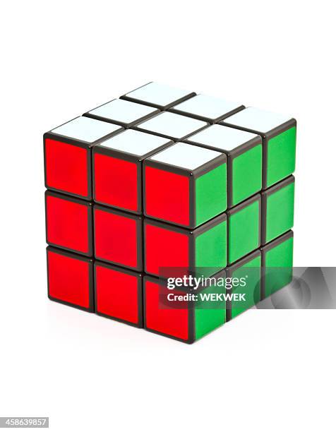 classic rubik's cube on white background - puzzle cube stock pictures, royalty-free photos & images