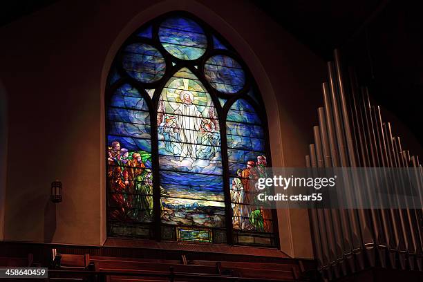 tiffany stained glass showing the ascension of jesus - ascension of jesus christ stock pictures, royalty-free photos & images