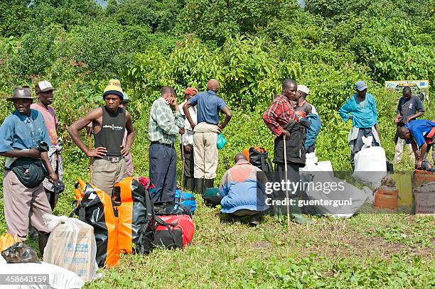 congolese porters before they start climbing mount nyiragongo, congo - zaire park stock pictures, royalty-free photos & images