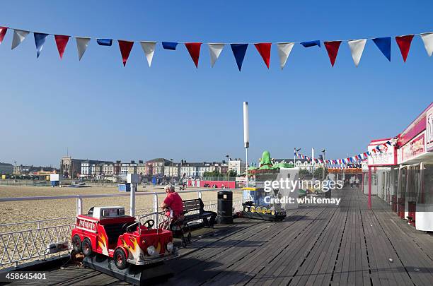 on the britannia pier in great yarmouth - boardwalk arcade stock pictures, royalty-free photos & images