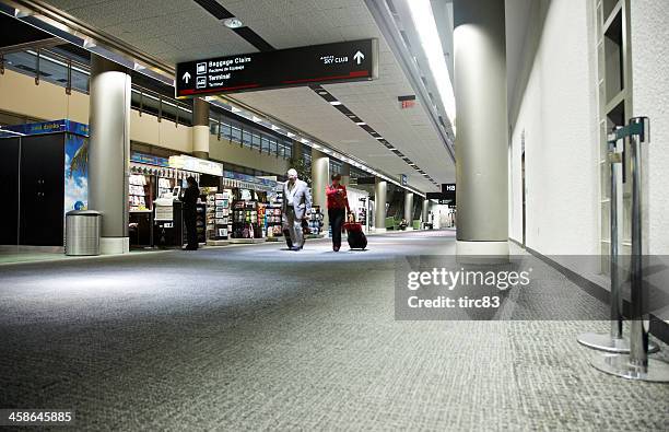 airport terminal interior - miami international airport stock pictures, royalty-free photos & images
